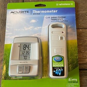 Indoor/outdoor thermometer with clock